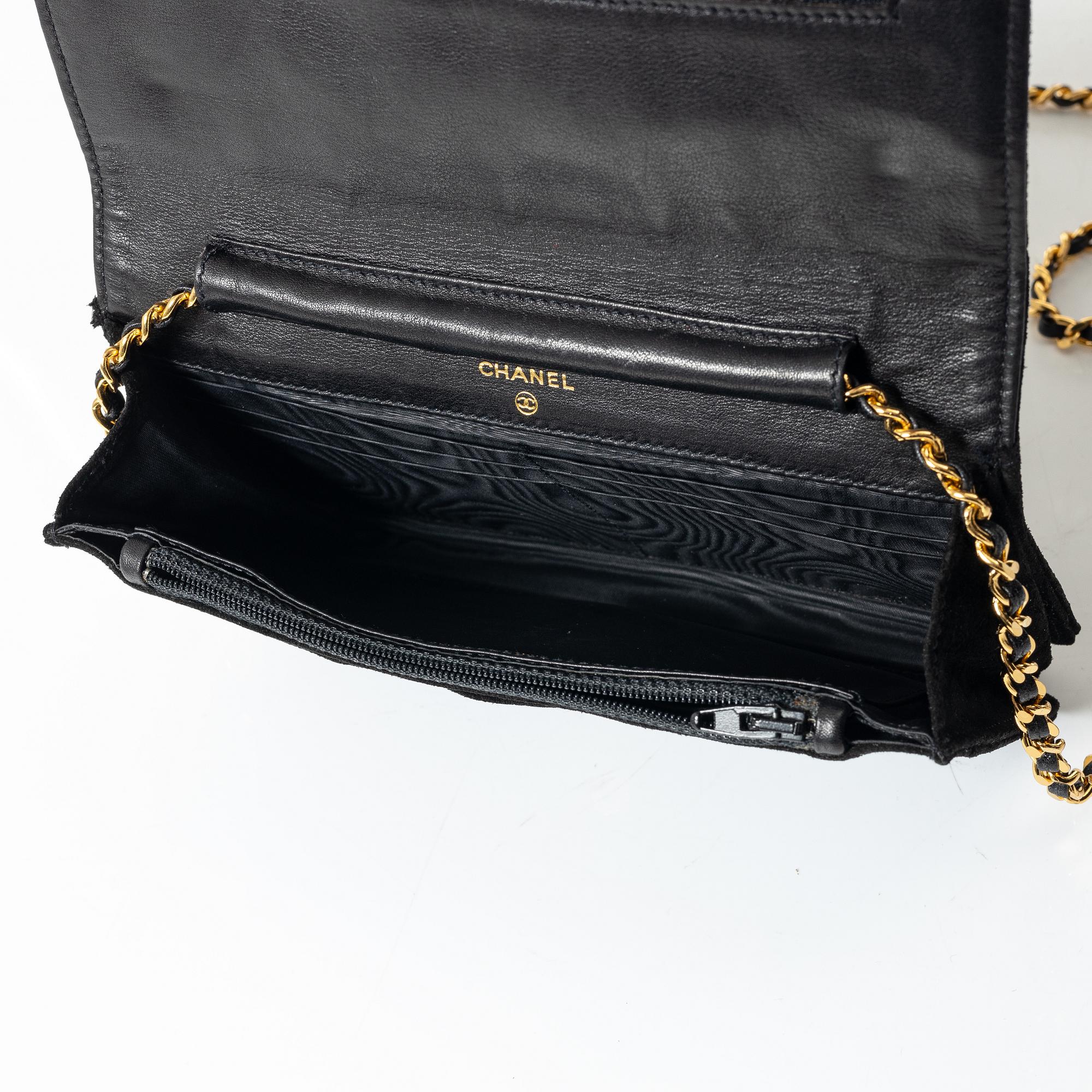 Chanel, A black suede vintage purse / wallet on chain.