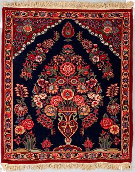 A RUG, a semi-antique Kashan, ca 83 x 70,5 cm.