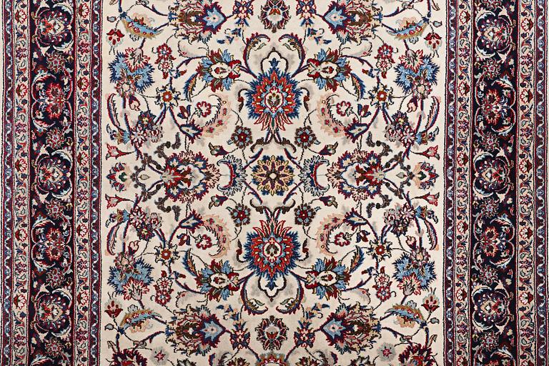 A carpet, Sarouk, part silk, c. 294 x 167 cm.