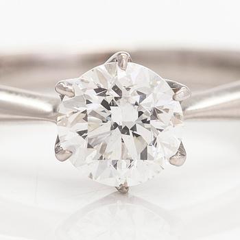 A platinum ring, with a brilliant-cut diamond approximately 1.00 ct according to the engraving.