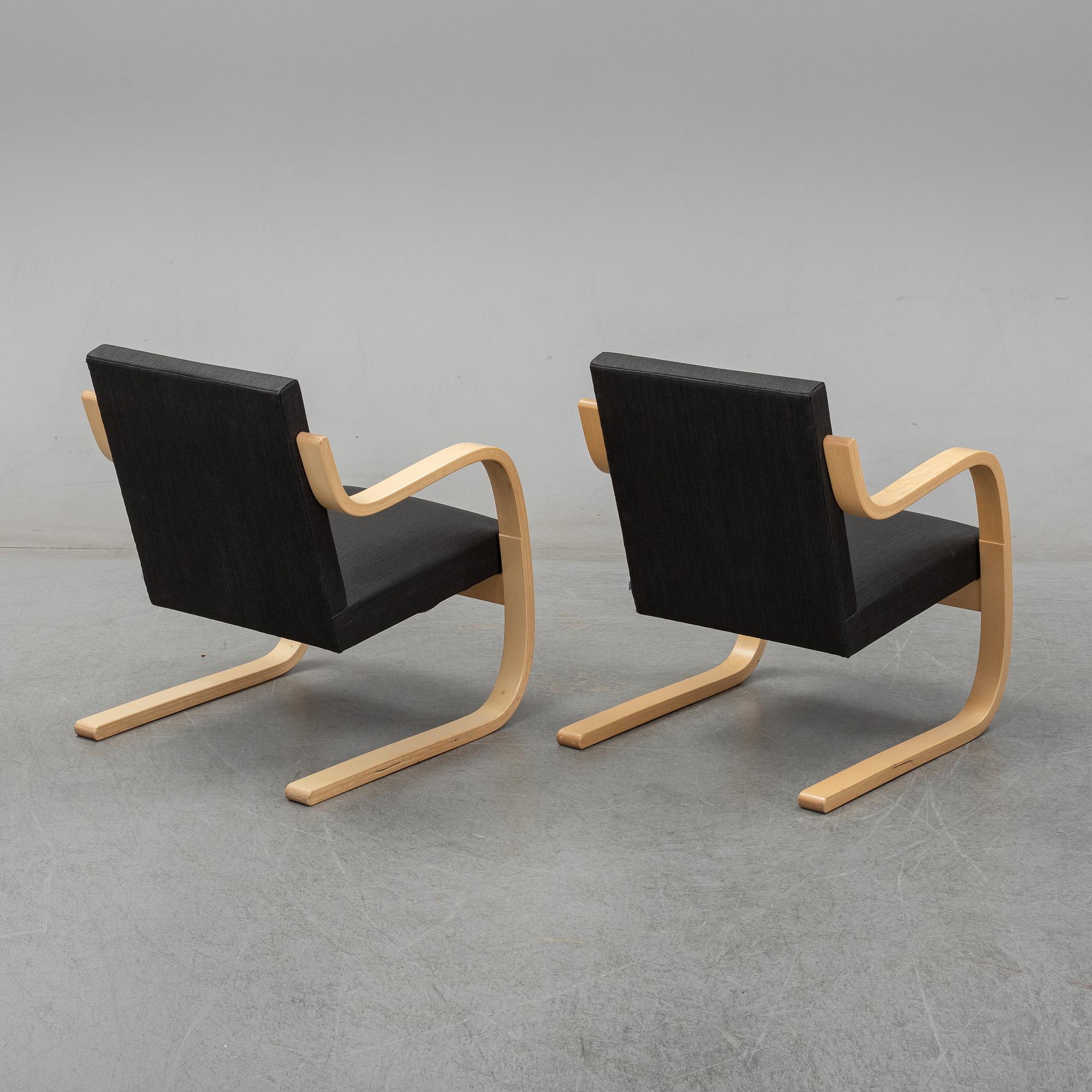 Alvar Aalto, a pair of model 406  birch armchairs, Artek, Finland, 2002.