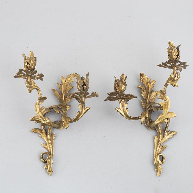 Appliquer, ett par, rokokostil, tidigt 1900-tal.