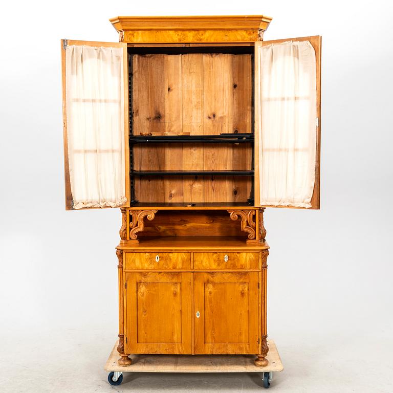 A Neo Rococo elm mid 1800s display cabinet.