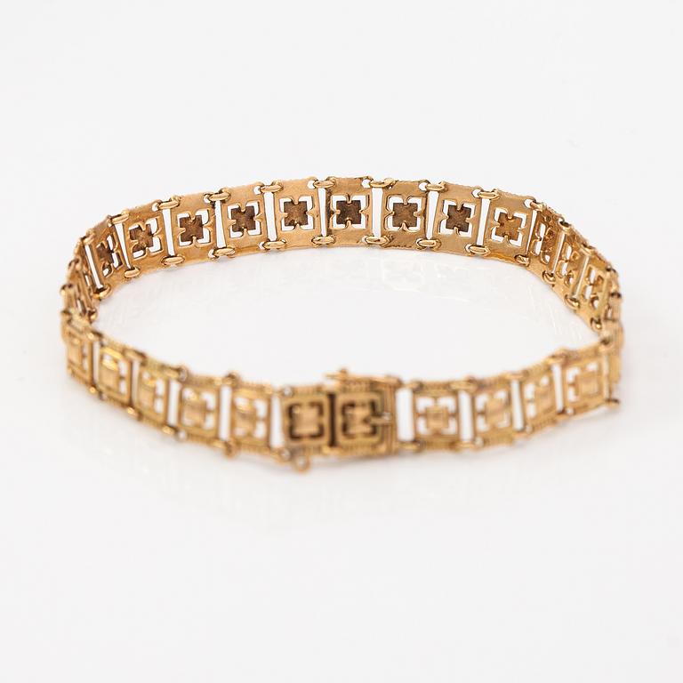 A 14K gold bracelet. Kallion kulta ja kello, Helsinki 1926.