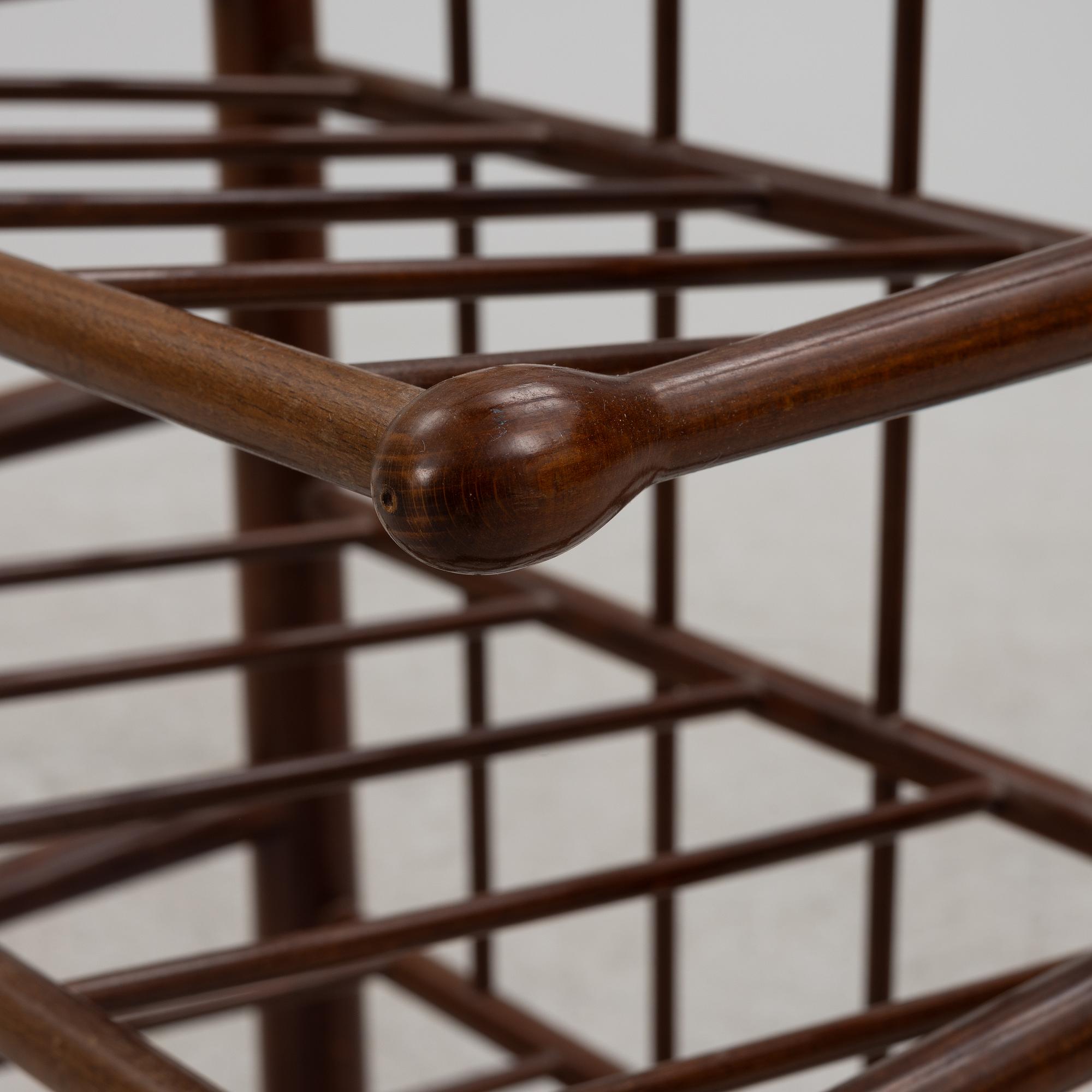 A magazine rack, mid-20th century.