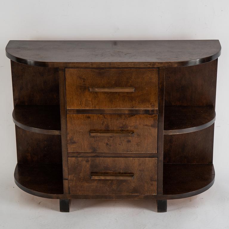 A stained birch chest of drawers and mirror, 1930's.