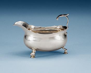 705. A Swedish 18th century silver cream-jug, makers mark of Jonas Thomasson Ronander, Stockholm 1774.