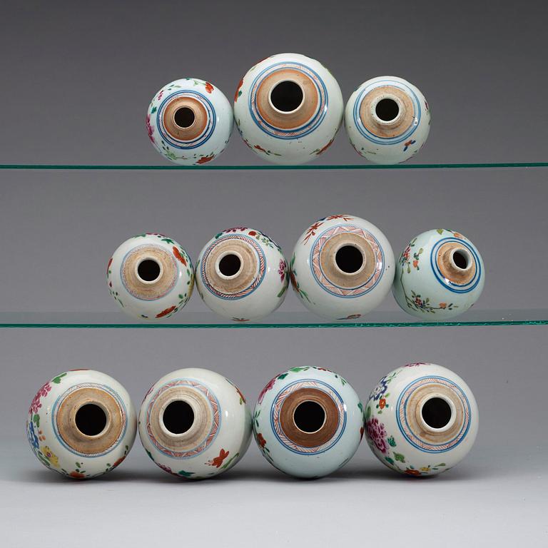 A set of 11 famille rose pots, Qing dynasty, Qianlong (1736-95).