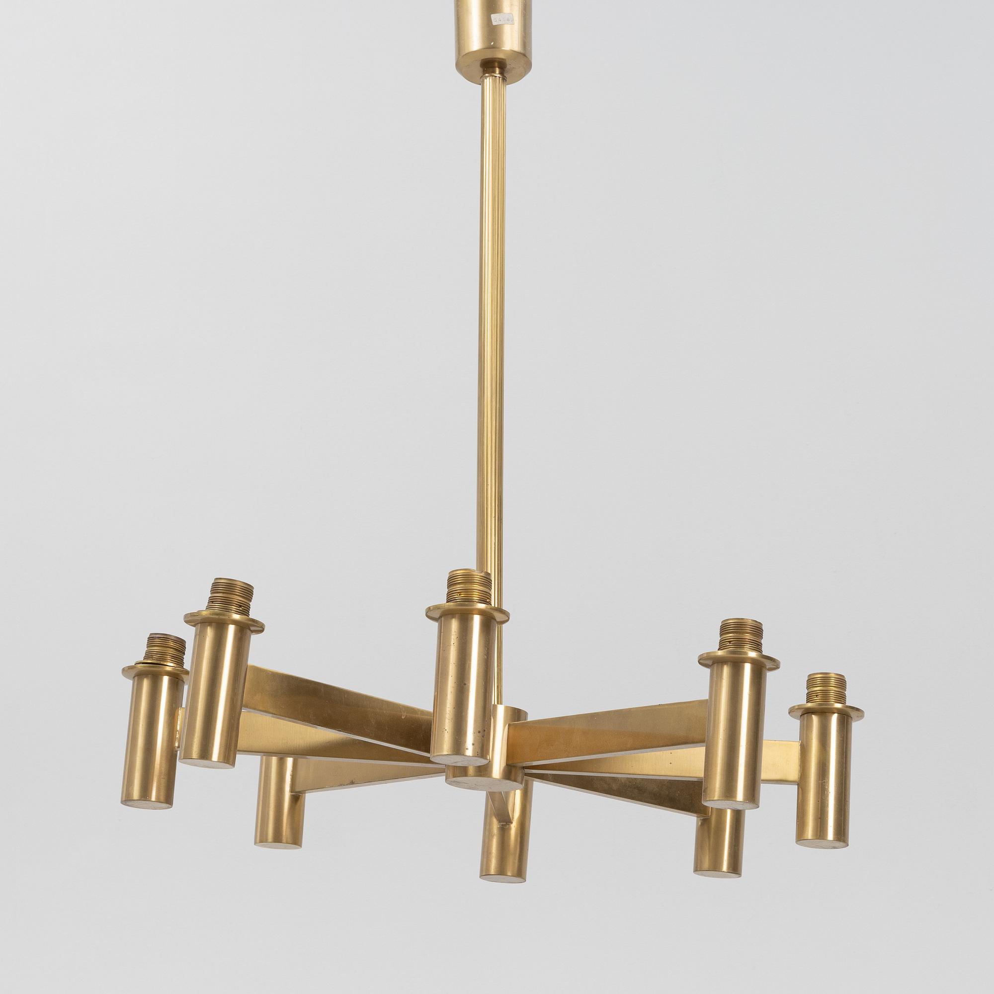 Hans-Agne Jakobsson, an eight-light brass ceiling light from Markaryd, Sweden.