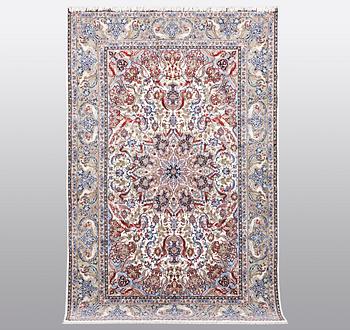 A carpet, Old Esfahan, part silk, ca 308 x 202 cm.