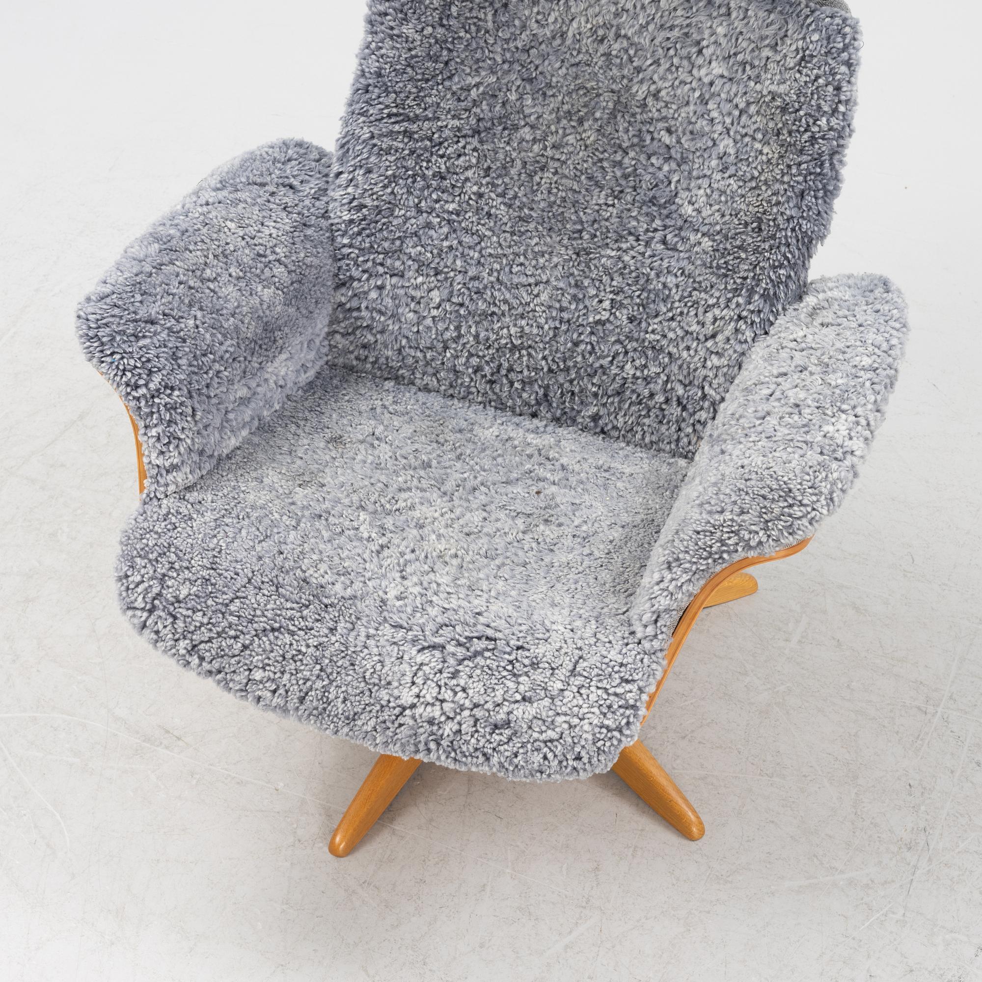 An 'Air' armchair with ottoman, Conform, 21st century.