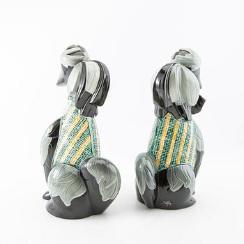 Figurines a pair of Goebel Germany late 20th century porcelain.