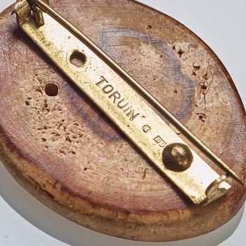 Vivianna Torun Bülow Hübe, a wood and brass brooch, executed in her own workshop in Stockholm ca 1952.