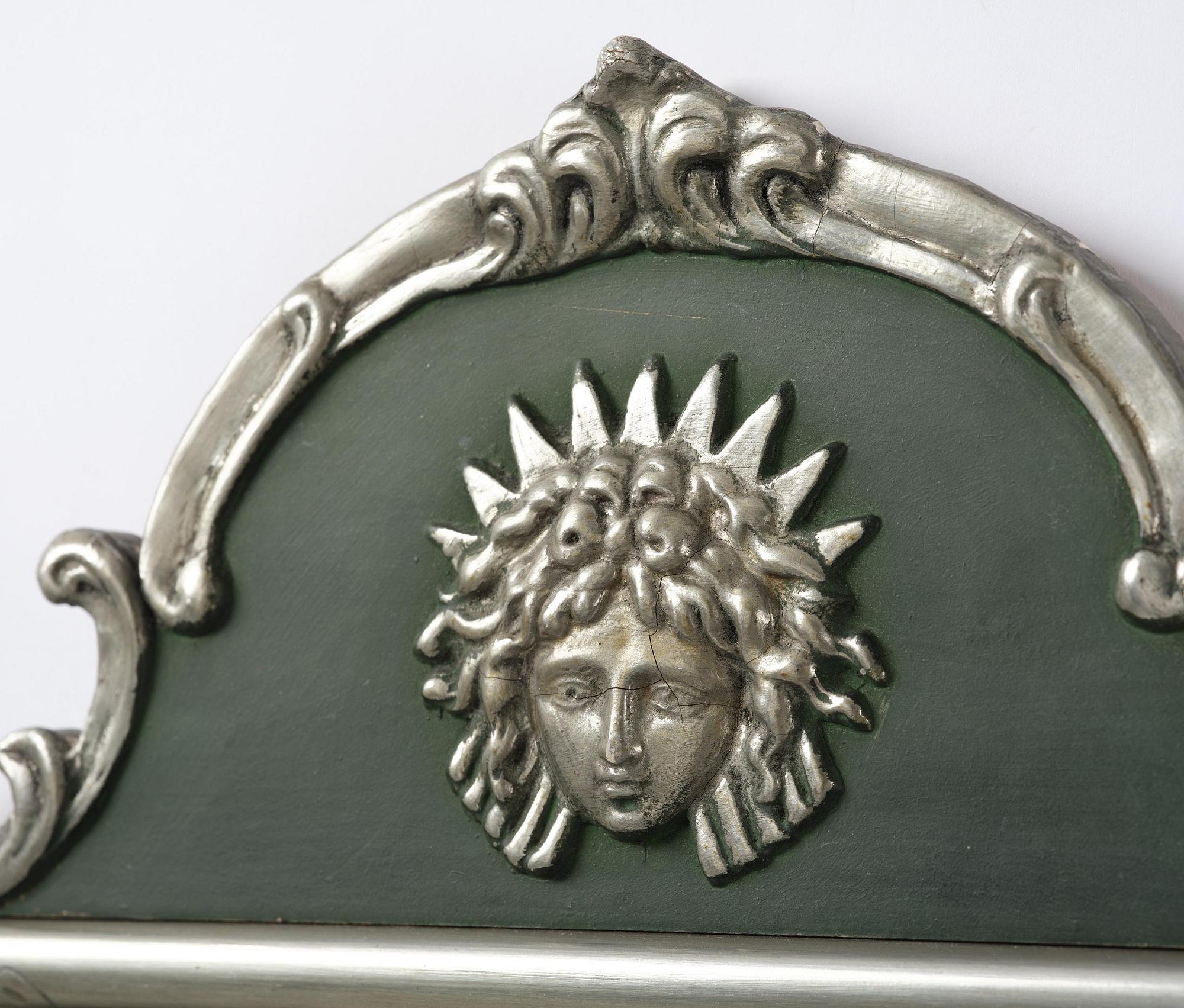 Swedish Grace, a wall mirror.