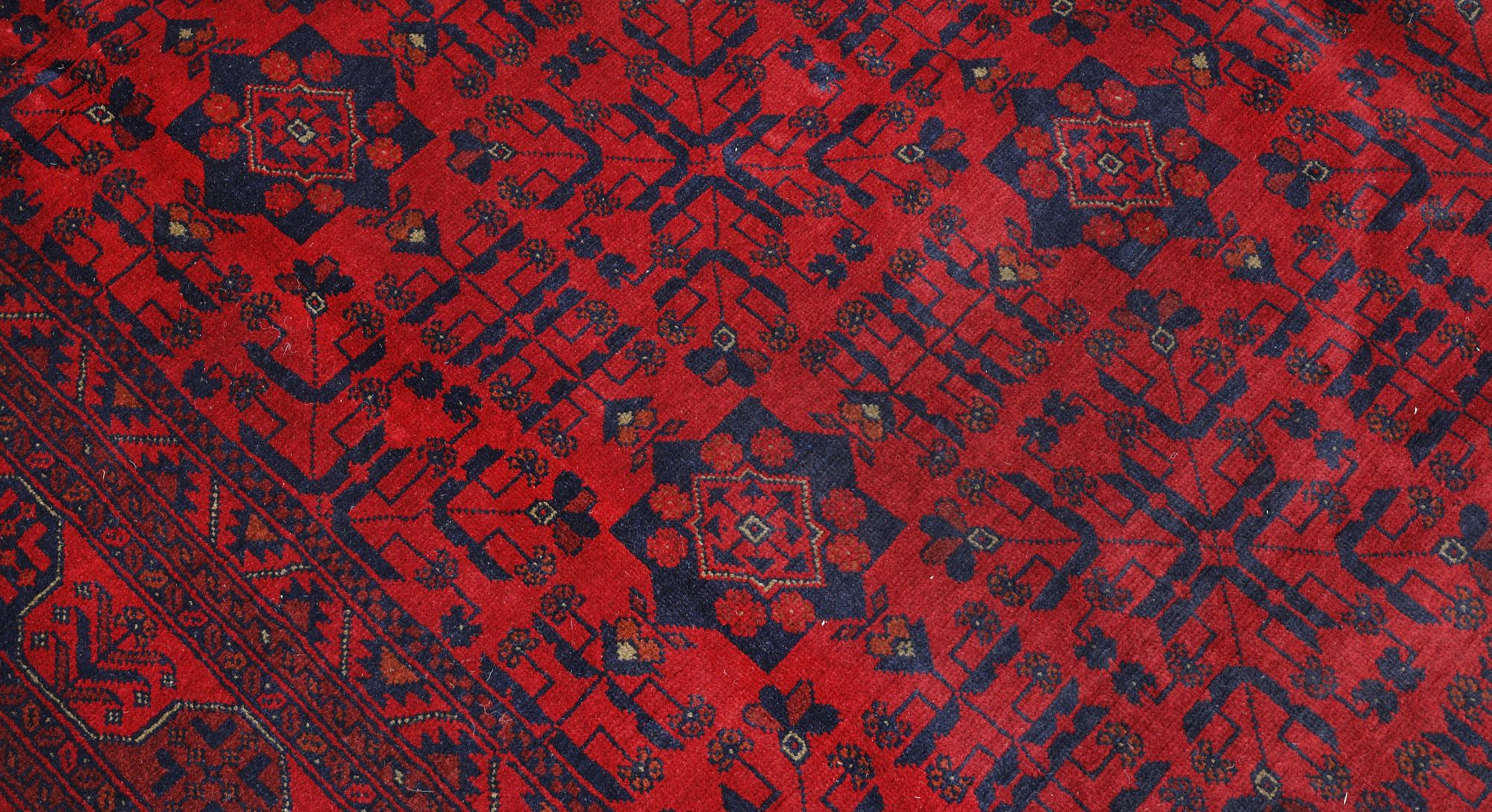 A Afghan fine carpet, 297 x 205 cm.