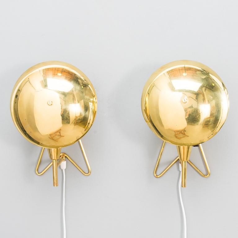 A pair of mid-20th-century wall lights / table lamps, model EV 57 for Itsu, Finland.