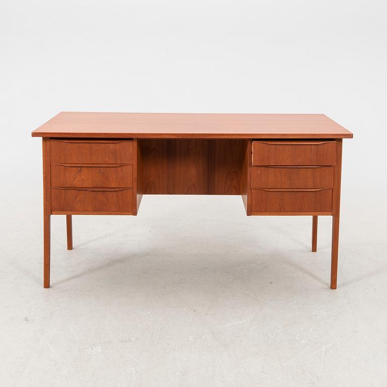 A 1950/60s teak desk.