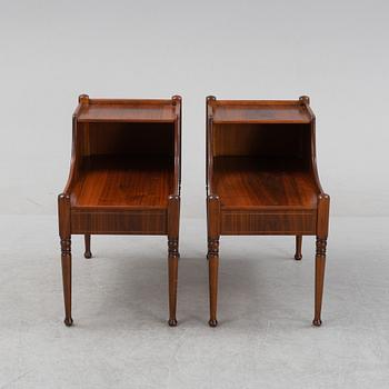A pair of mahogany veneered bedside tables, later part of the 20th Century.