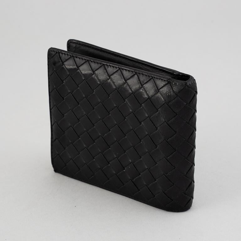 Bottega veneta, a black leather wallet.