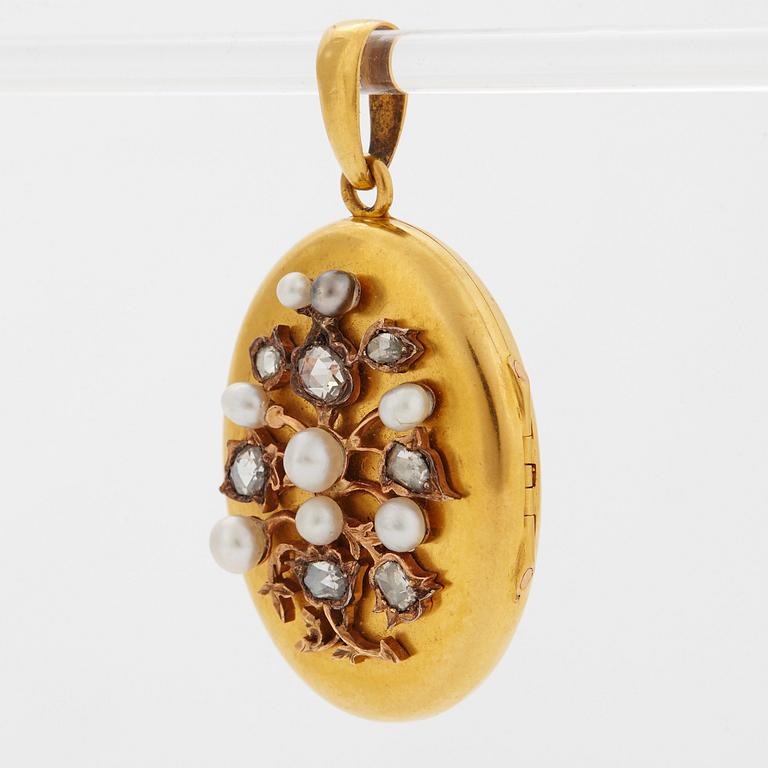 An 18K gold locket set with rose-cut diamonds and pearls.