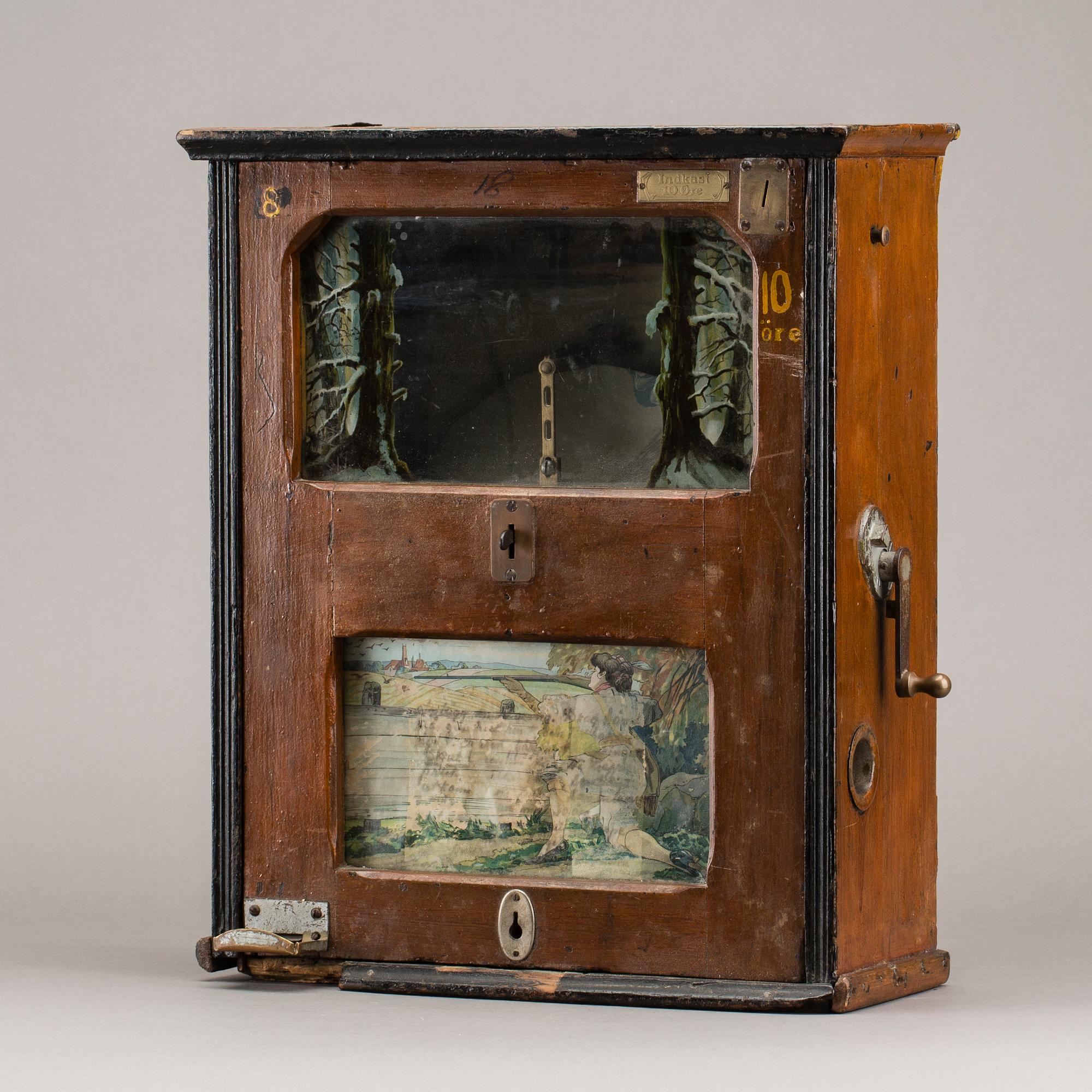 AMUSEMENT MACHINE, early 20th century.