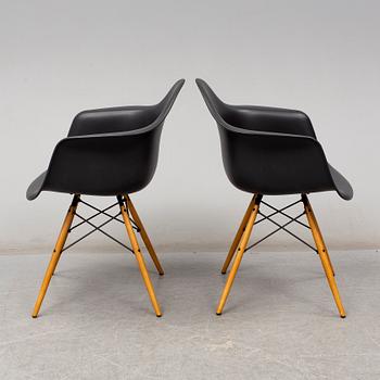 CHARLES & RAY EAMES, a pair of 'DAW' armchairs, Vitra, 2017.