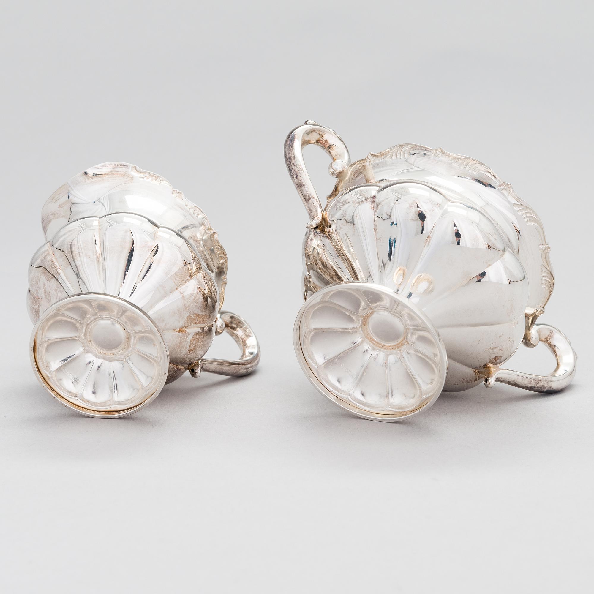 A silver coffee pot, a parcel-gilt sugar bowl and cream jug, Turku Finland 1946 and 1985.