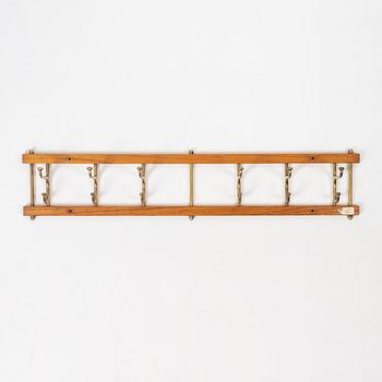 Klädhängare, "Dekorativ", Skoglunds metallgjuteri, Anderstorp, 1950/60-tal.