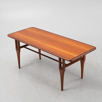 A Scandinavian teak coffee table.