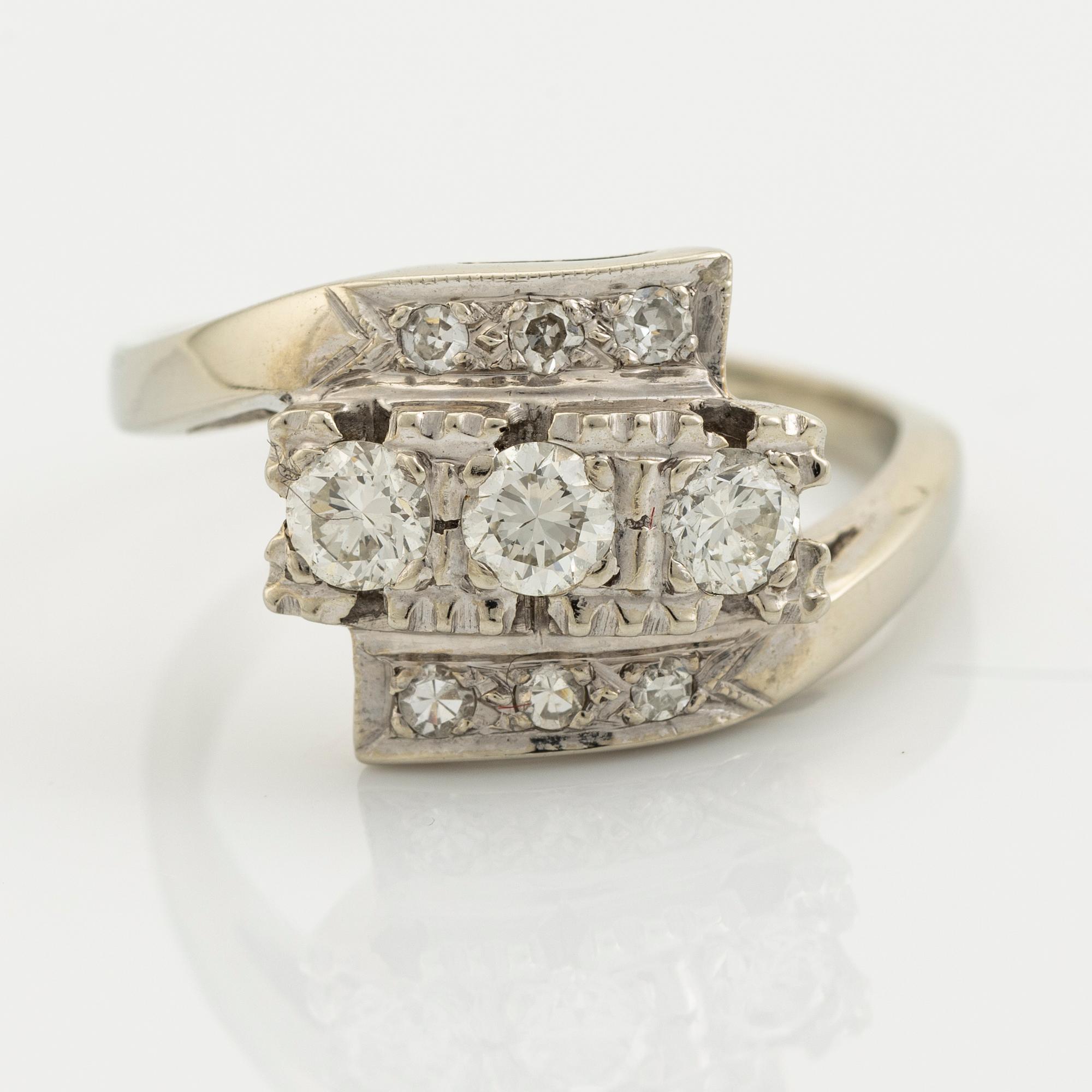 A 14K gold ring set with diamonds.