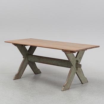 A 19th Century painted pine table.