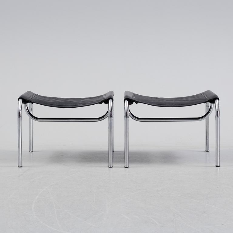 A pair of easy chairs and ottoman, designed by Hans Eichenberger, Strässle, Switzerland.