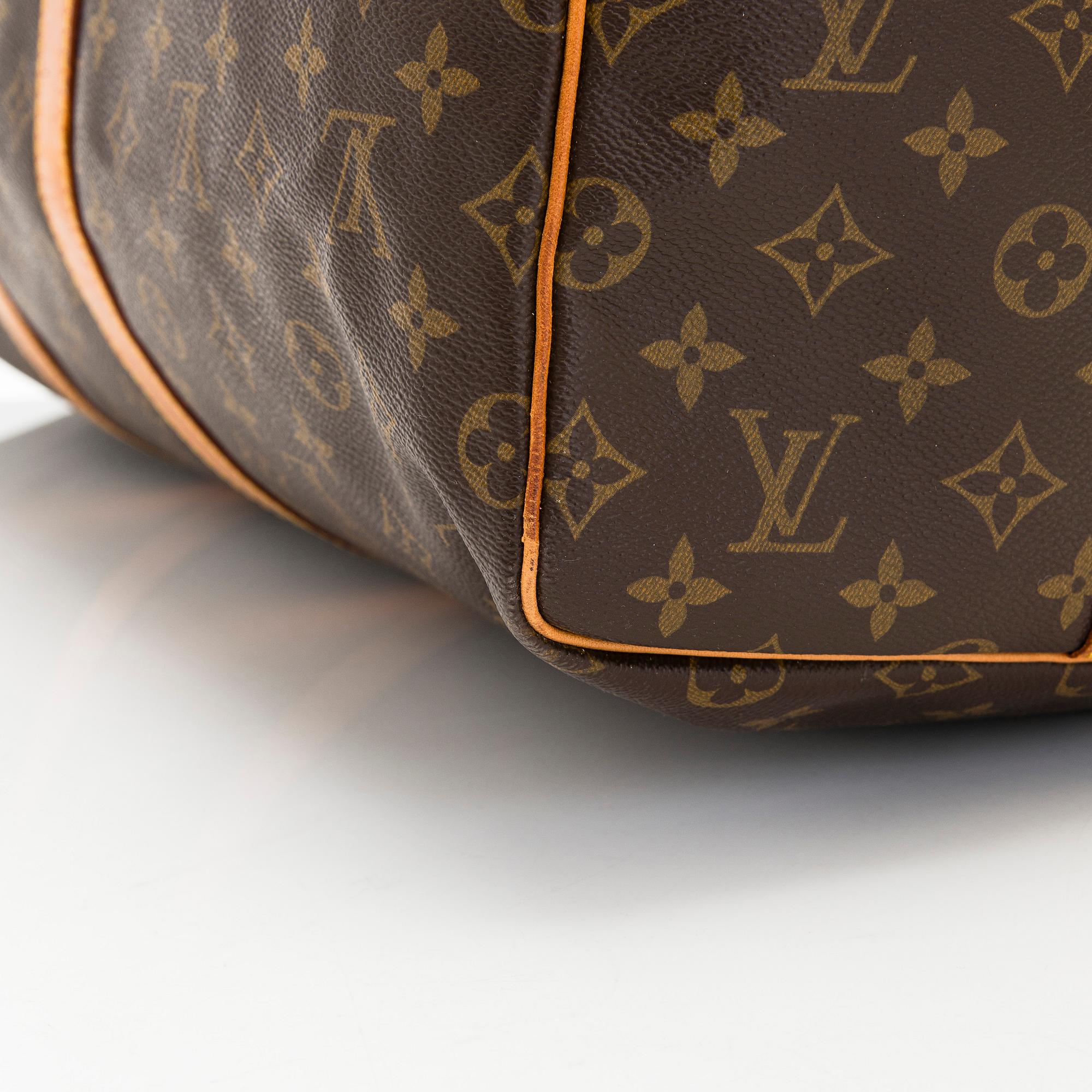 Louis Vuitton, a Monogram Canvas 'Keepall 55 Bandoulière' weekend bag.