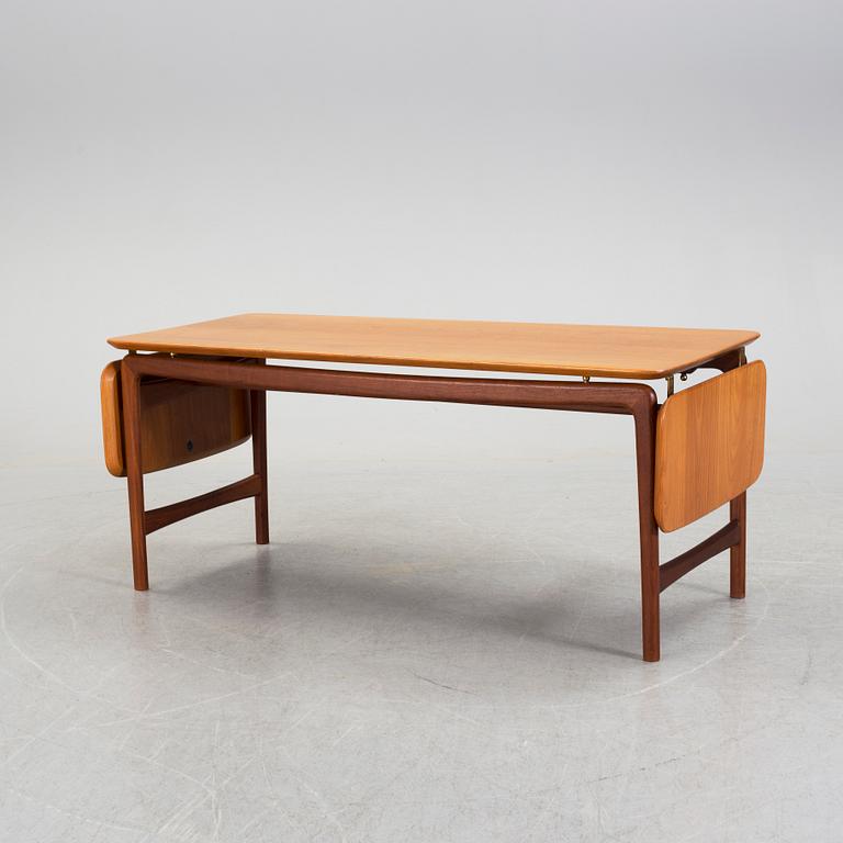 A table by Peter Hvidt & Orla Mölgaard Nielsen, France & Daverkosen.