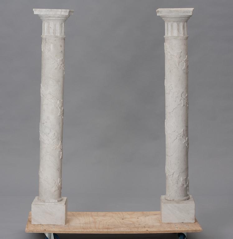 A pair of marble columnes.