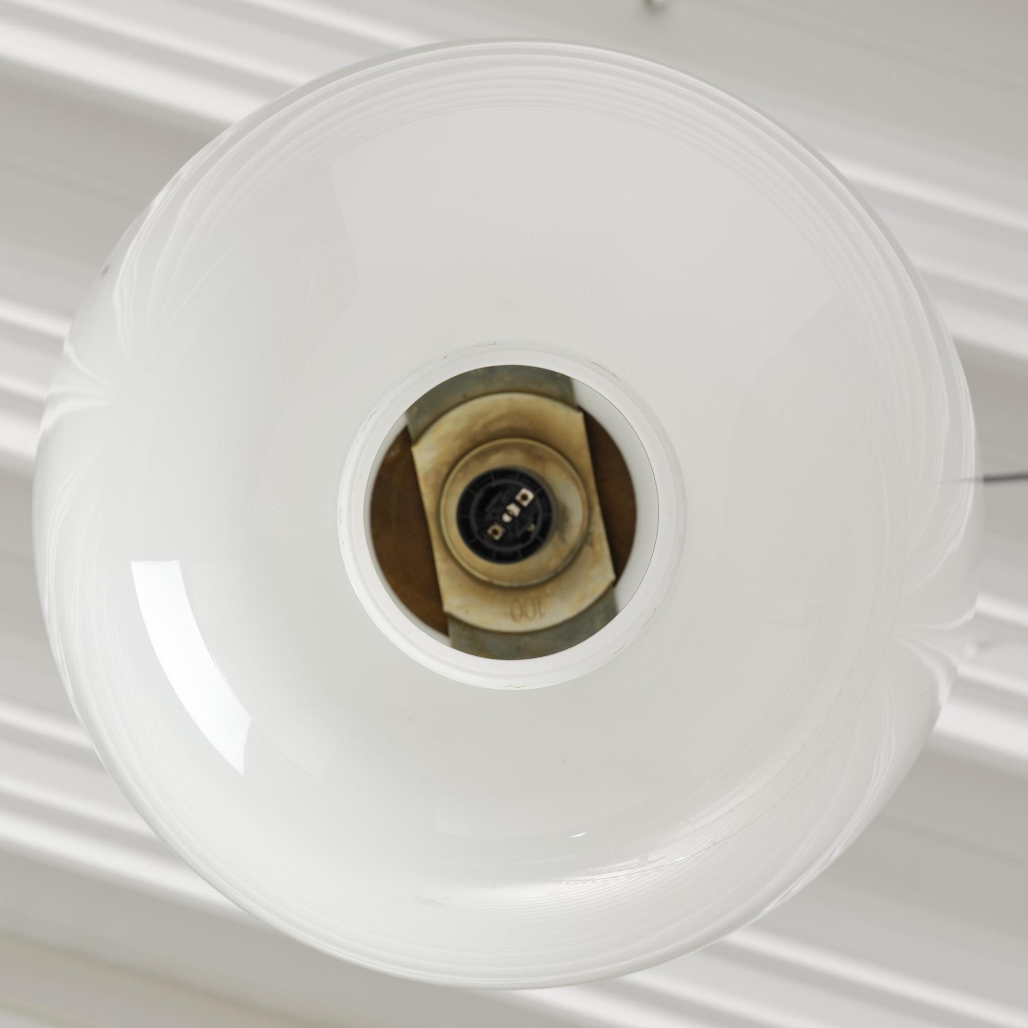 Harald Notini, a pair of ceiling lamps model 11472, Arvid Böhlmarks Lampfabrik, Stockholm, 1940s.