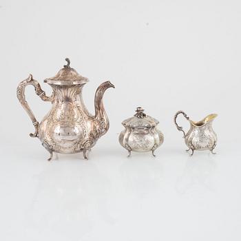 A Swedish silver coffee pot, sugarbowl and a creamer, including Sven Carlsson, Stiltenn, Stockholm 1968.