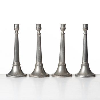 A set of four Swedish late Gustavian pewter candlesticks by E P Krietz, made in Stockholm.