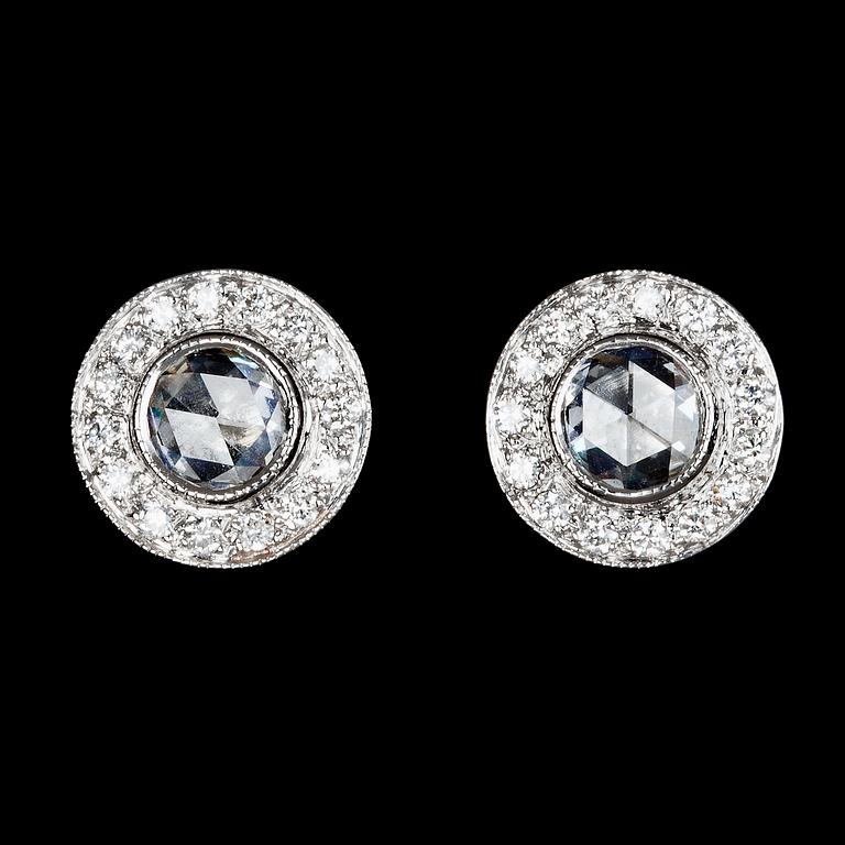 A pair of rose cut diamond earstuds.