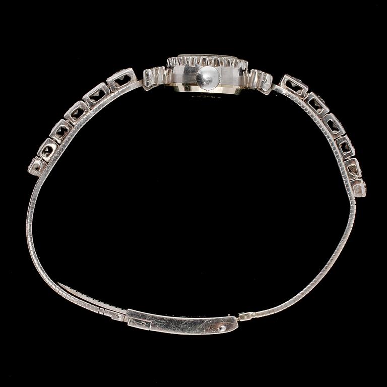 DAMARMBANDSUR, Reimar, 18k vitguld med 16 briljantslipade och 26 åttkantslipade diamanter, 1900-tal. Vikt 29 g.