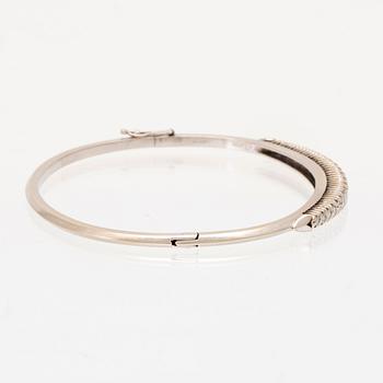 Stelt armband 18K vitguld med runda briljantslipade samt enkelslipade diamanter, Italien.