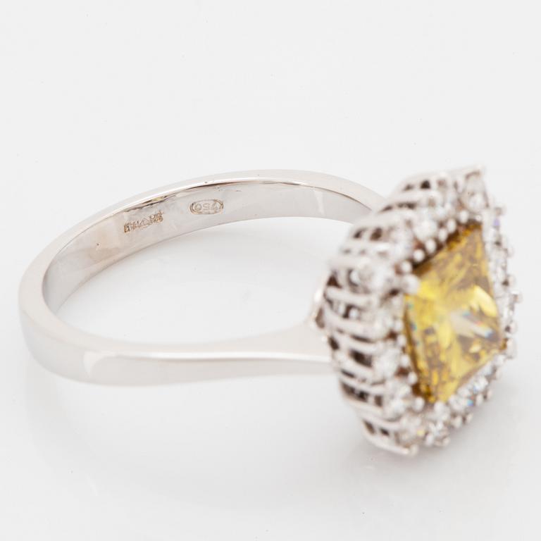 Princess-cut colour treated fancy deep brown-yellow diamond ring.