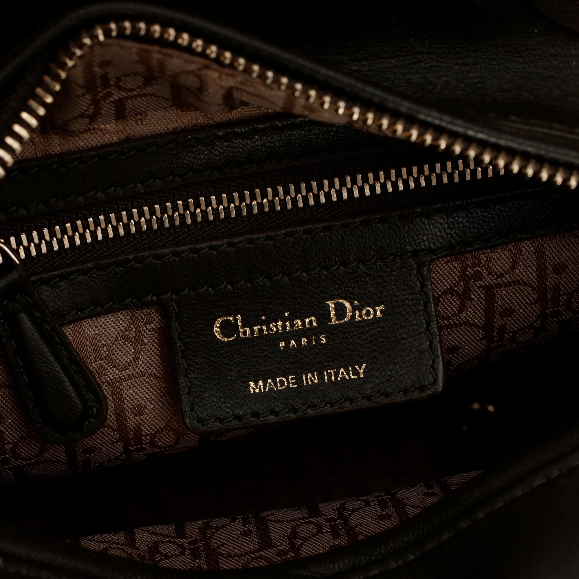 CHRISTIAN DIOR, a green leather "Lady Dior" bag.