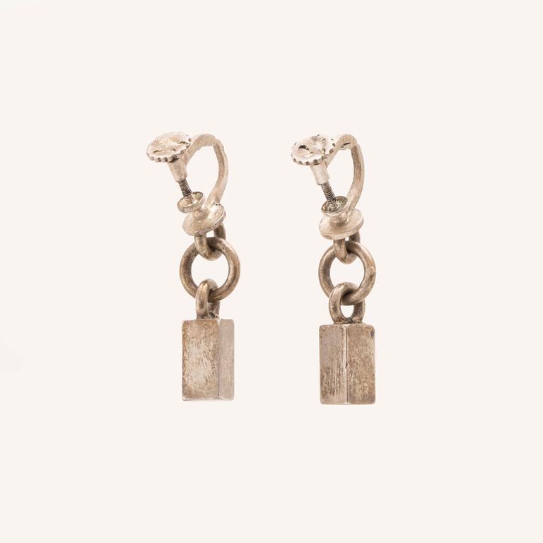 A pair of silver earrings by Wiwen Nilsson.