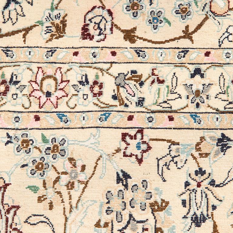 A carpet, Nain, part silk s.k 9LAA. Circa 376 x 249 cm.