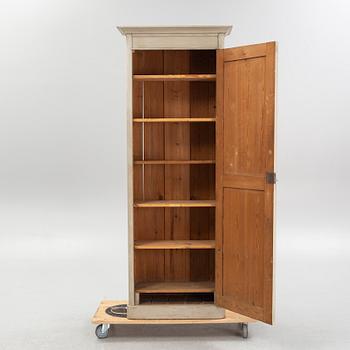 A cabinet, circa 1900.