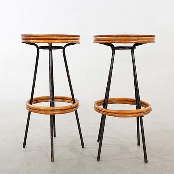 A set of four mid 20th century bar stools.