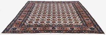 An antique Veramin carpet, West Persia, 380 x 271 cm.