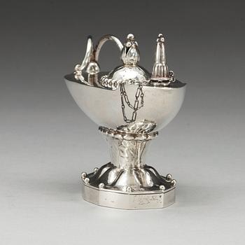 A Georg Jensen cigar lighter in the shape of an oil lamp, Copenhagen 1915-19.