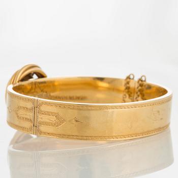Möllenborg armring 18K guld med en gammalslipad diamant samt pärlor och svart emalj.